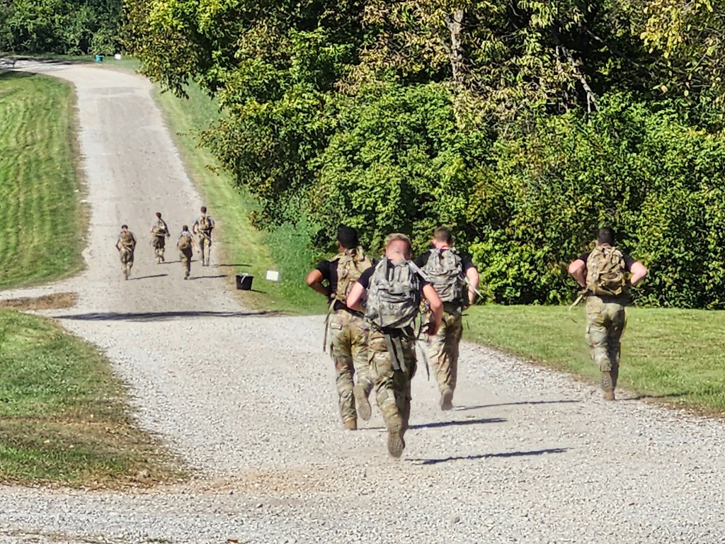 Soldiers Rucking up Queenslake Road for Mogadishu Mile