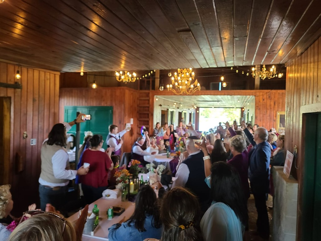 Sunset Barn and Wedding Barn Rustic Reception Toast at Queenslake